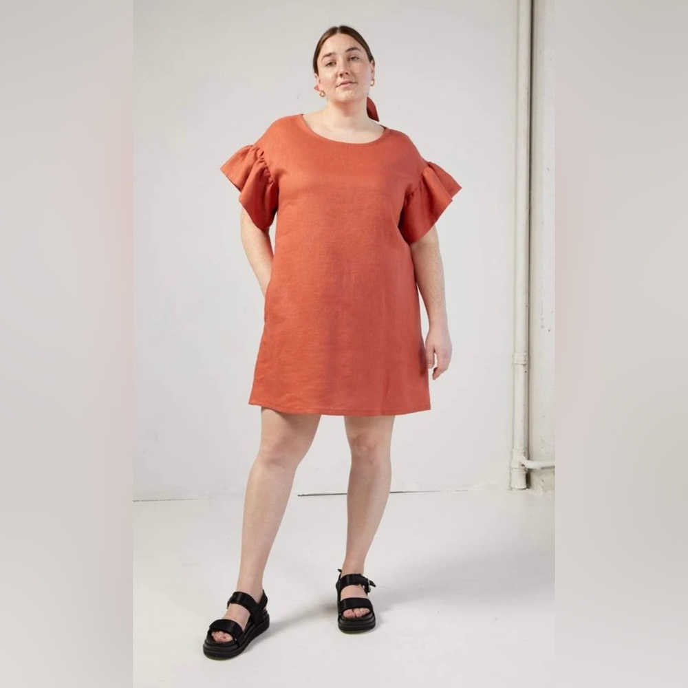 Eliza Faulkner Raffi dress in terracotta. Size medium.